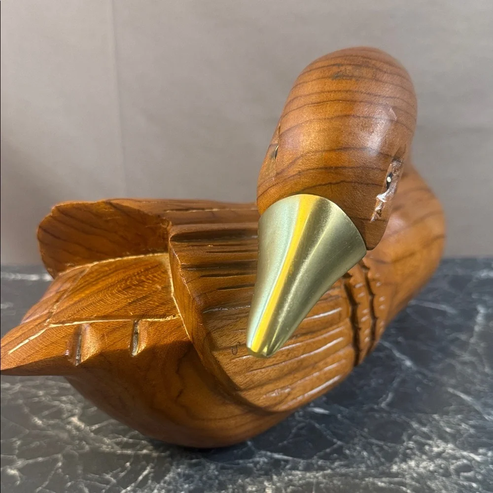 Handcrafted vintage Wooden goose decoy with brass beak